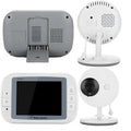 White UFO-style wireless baby monitor camera and 3.5-inch parent unit on a nursery shelf.