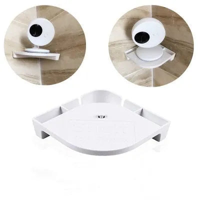 White UFO-style wireless baby monitor camera and 3.5-inch parent unit on a nursery shelf.