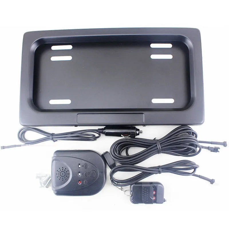 Black flipping licence plate frame made of iron and plastic measuring 314 by 169 millimetres, suitable for US standard plates