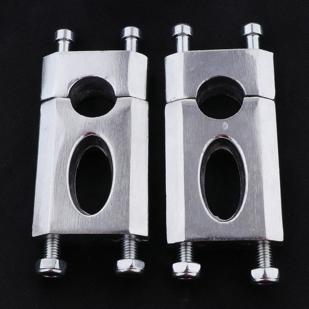Silver CNC machined aluminum alloy handlebar riser set with screws for 22mm motorcycle mount, 68mm rise