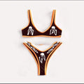 Black bikini swimsuit with chest pad, 80% polyester fibre, sizes S to XL