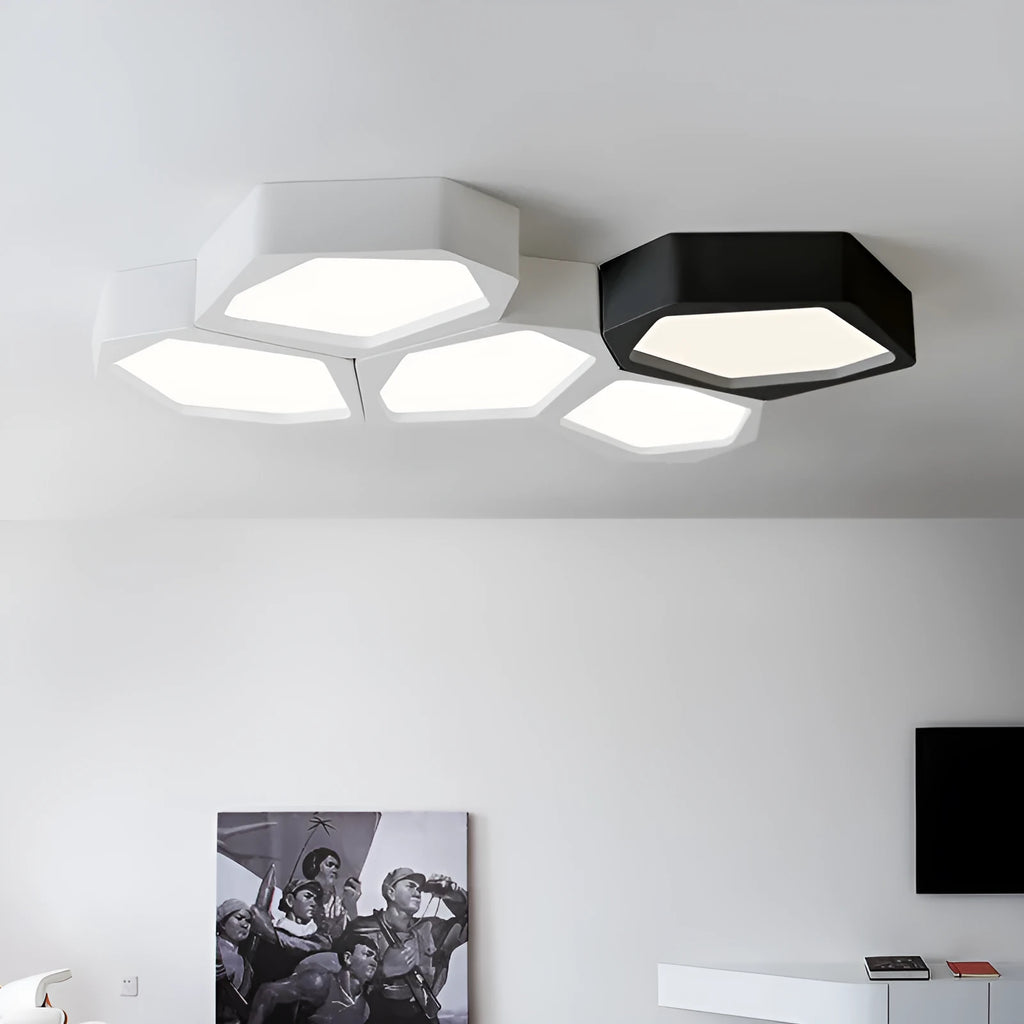 Geometric shaped black iron LED pendant light with remote control for dimming and colour temperature adjustment.