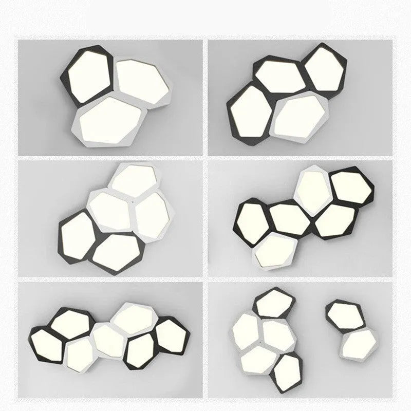 Modern geometric shaped LED wall light in black or white iron frame with remote control.