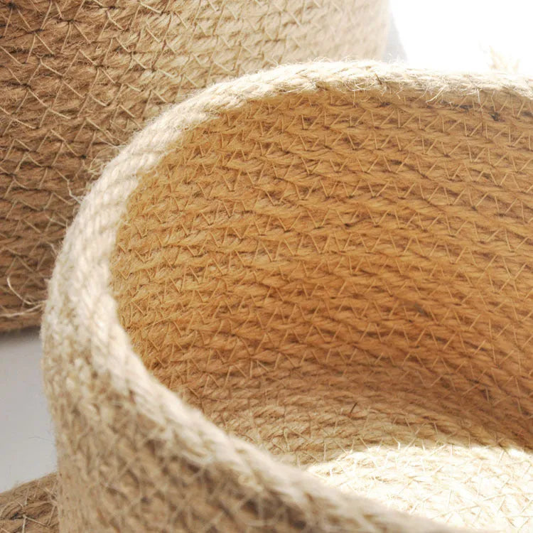 Japanese-style linen fabric storage basket with a cover on a tabletop, shown in three sizes.