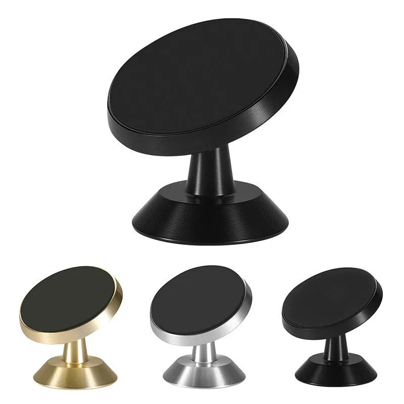 Black magnetic car phone holder mounted on dashboard with smartphone attached