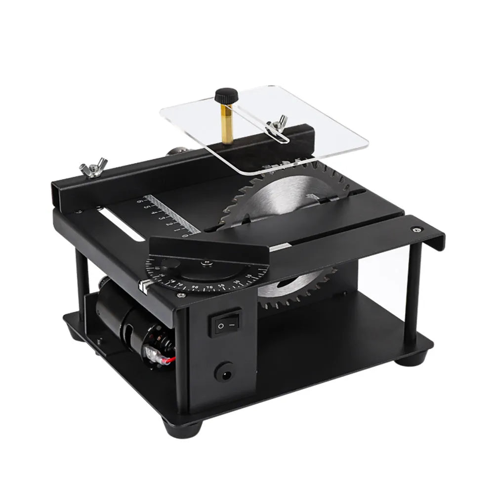 Black miniature precision sliding table saw with 110mm blade on a compact worktable