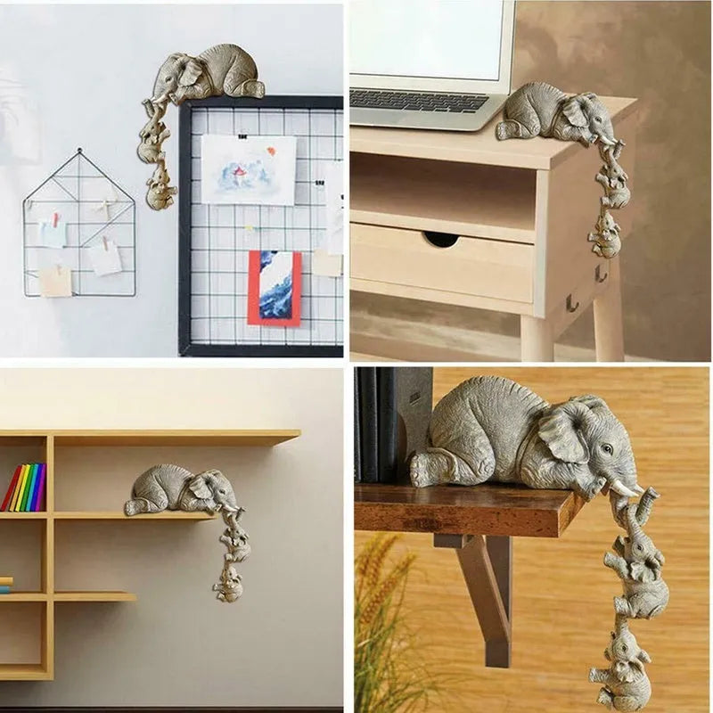 Resin mother elephant figurine with baby elephant, 10cm and 5cm tall, set in protective packaging