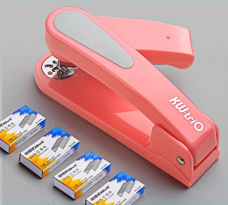 Black rotatable desktop stapler shown with head rotated, demonstrating 90mm deep throat for centre binding.