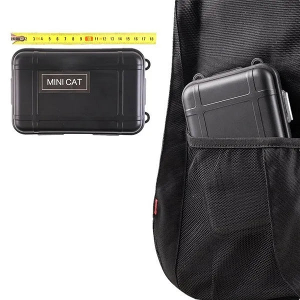Black stainless steel survival box with 13 emergency tools including compass, flashlight, and wire saw