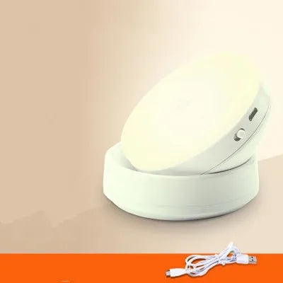 Two white wireless motion sensor LED lights for cabinets and hallways.