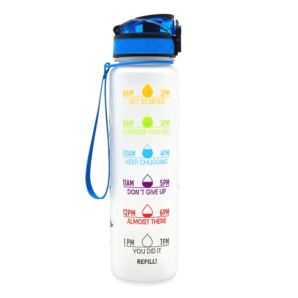 Blue-red gradient 1L Tritan water bottle with time markers and flip-top lid on a gym bag