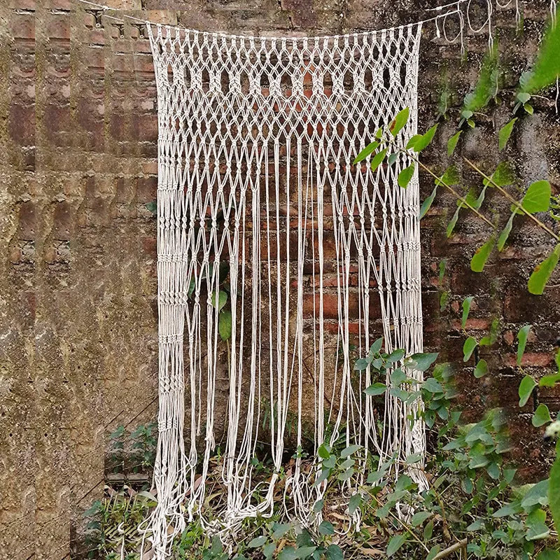 White perforated woven partition curtain with tassel trim, available in four sizes for doorways and windows.