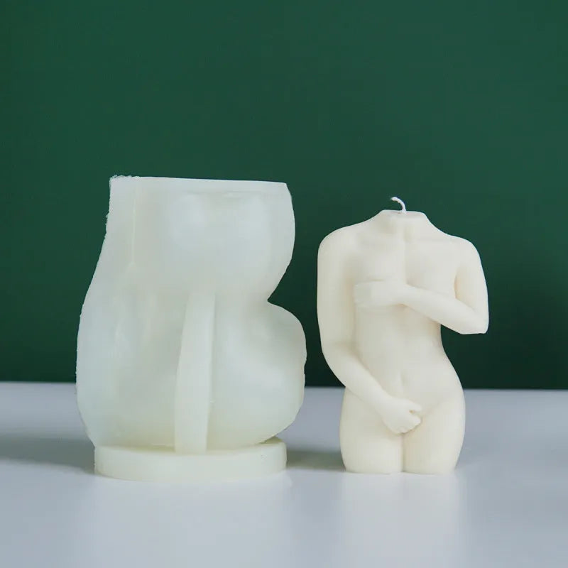 Silicone mould for making female body shaped candles, soaps, or cake decorations in three shy female silhouette designs.