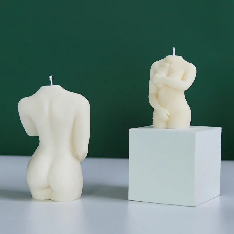Silicone mould for making female body shaped candles, soaps, or cake decorations in three shy female silhouette designs.