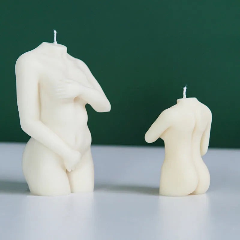 Silicone mould for making female body shaped candles, soaps, or cake decorations in three shy female silhouette designs.