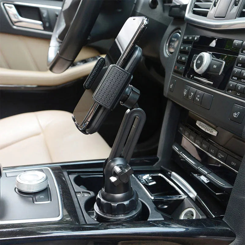 Black ABS car phone holder with 360-degree rotation and adjustable height on a car vent.