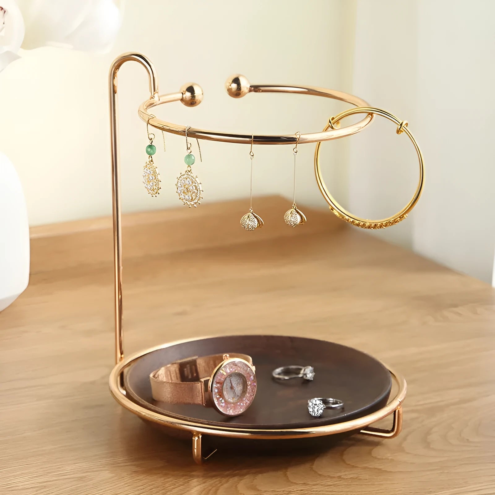 Walnut-coloured solid wood jewellery rack with metal hooks, measuring 21cm wide.