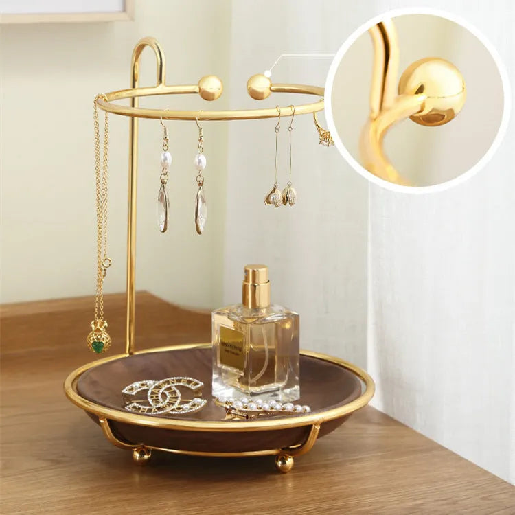 Walnut-coloured solid wood jewellery rack with metal hooks, measuring 21cm wide.