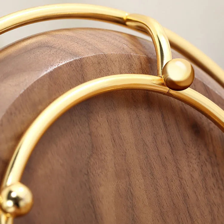 Walnut-coloured solid wood jewellery rack with metal hooks, measuring 21cm wide.
