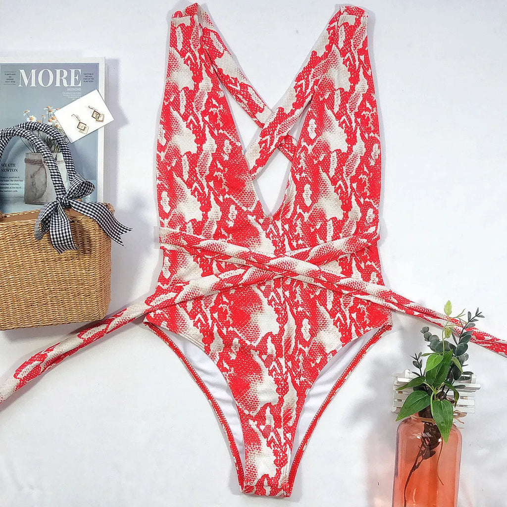 Women's push up halter swimsuit with deep V neck, lace tie and grid pattern in white or red