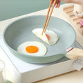 Korean-style macadamite non-stick frying pan with temperature-sensing feature in green colour