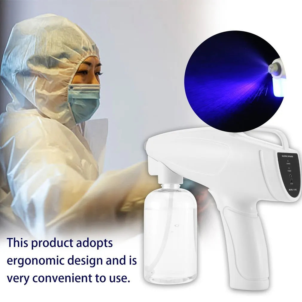 White handheld wireless electric spray disinfection gun with USB-C port and bottle attached