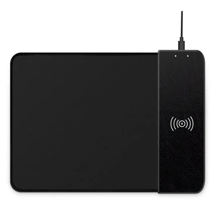 Black wireless charging mouse pad with RGB lighting on a desk