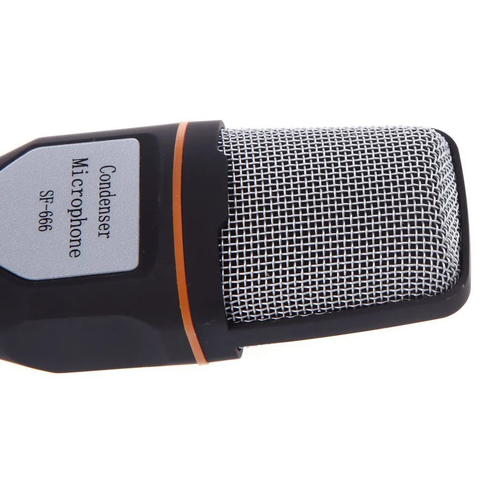Black wired desktop PC microphone with a 13.3cm body mounted on a silver metal clip, showing a 1.85m coiled cable.