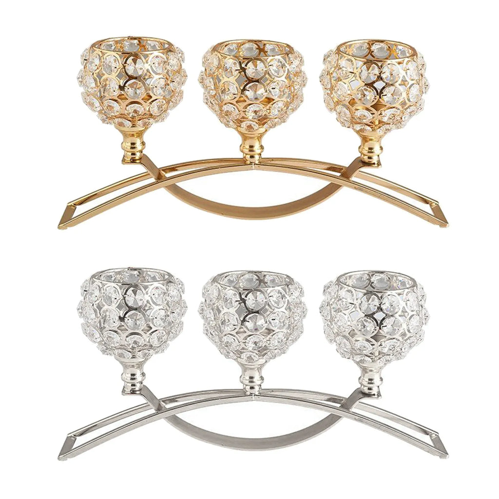 Geometric crystal candle holder with gold electroplated wrought iron frame on a table