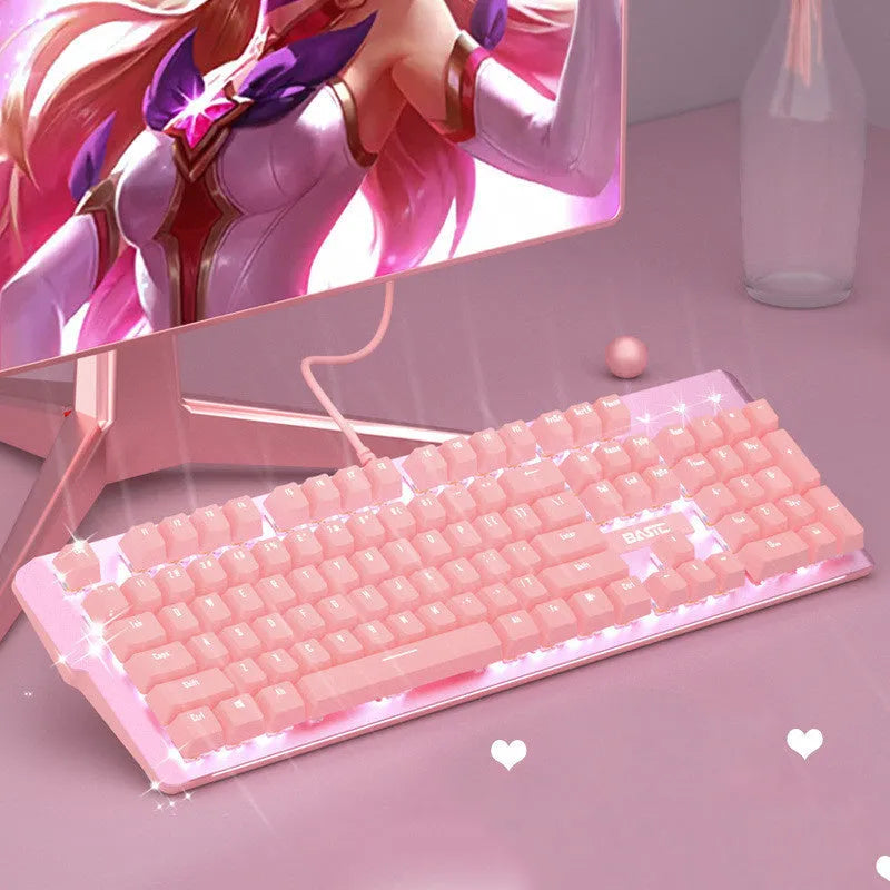 Pink mechanical keyboard and matching wired mouse set for PC gaming on a desk