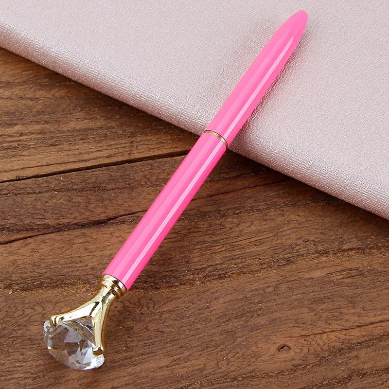 Metal rotating ballpoint pen with diamond crystal design, 1.0mm tip, 22g, in rose gold colour