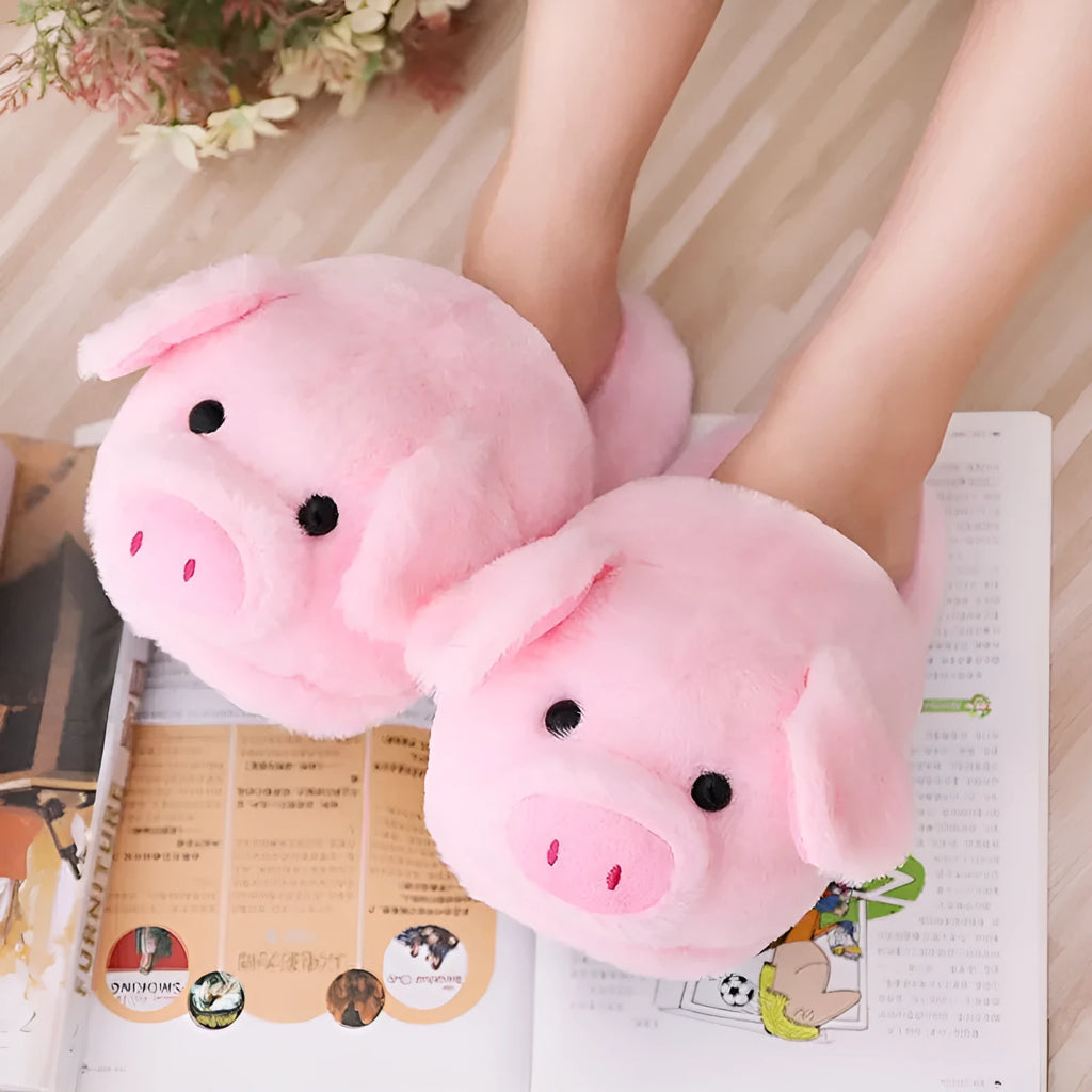 Women's warm winter house slippers in pink plush with animal pig design and PP cotton filling