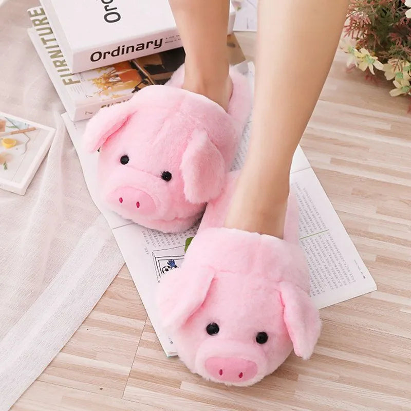 Women's warm winter house slippers in pink plush with animal pig design and PP cotton filling