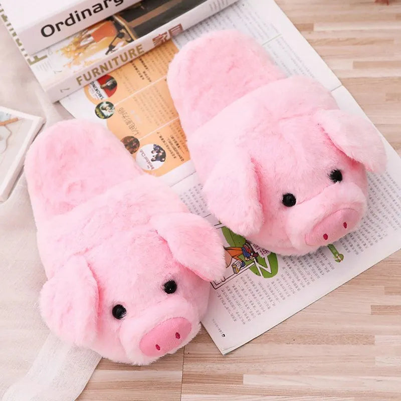 Women's warm winter house slippers in pink plush with animal pig design and PP cotton filling