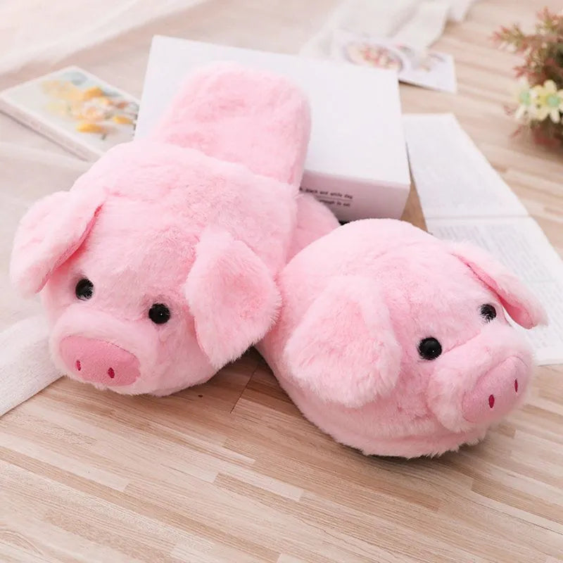 Women's warm winter house slippers in pink plush with animal pig design and PP cotton filling