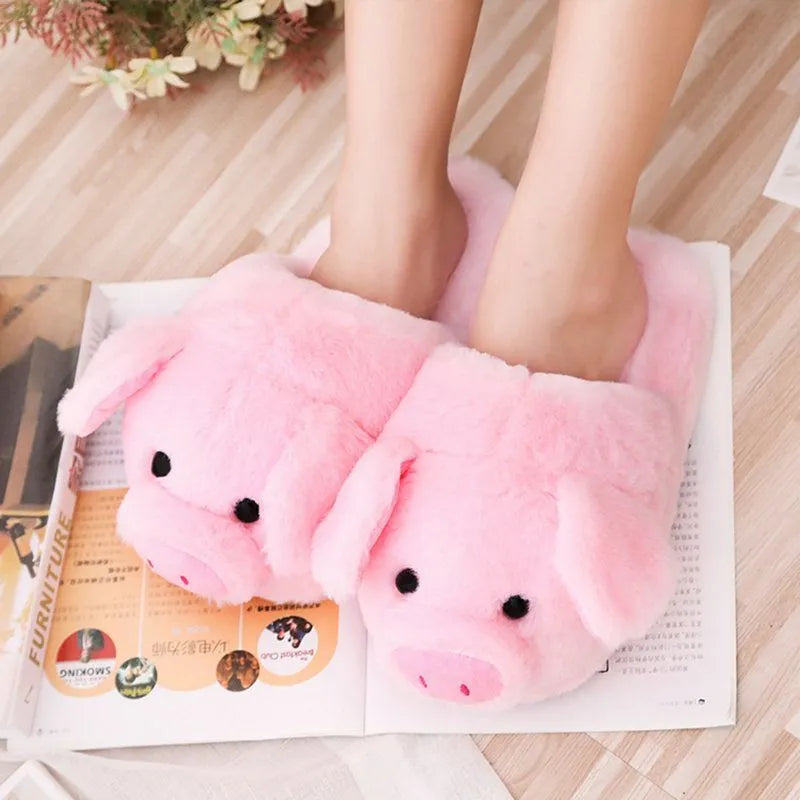 Women's warm winter house slippers in pink plush with animal pig design and PP cotton filling