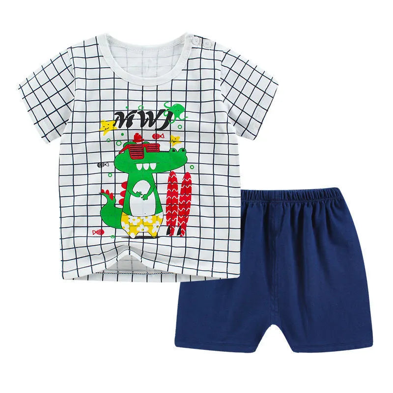 Summer infant cotton two-piece set showing kids' T-shirt and shorts with cartoon print.