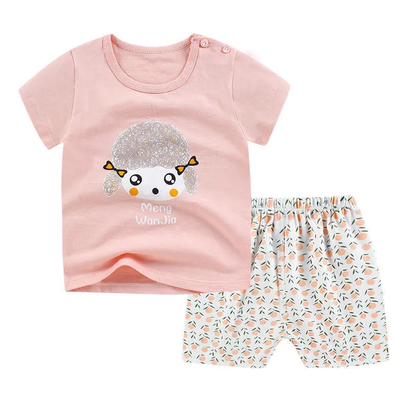 Summer infant cotton two-piece set showing kids' T-shirt and shorts with cartoon print.