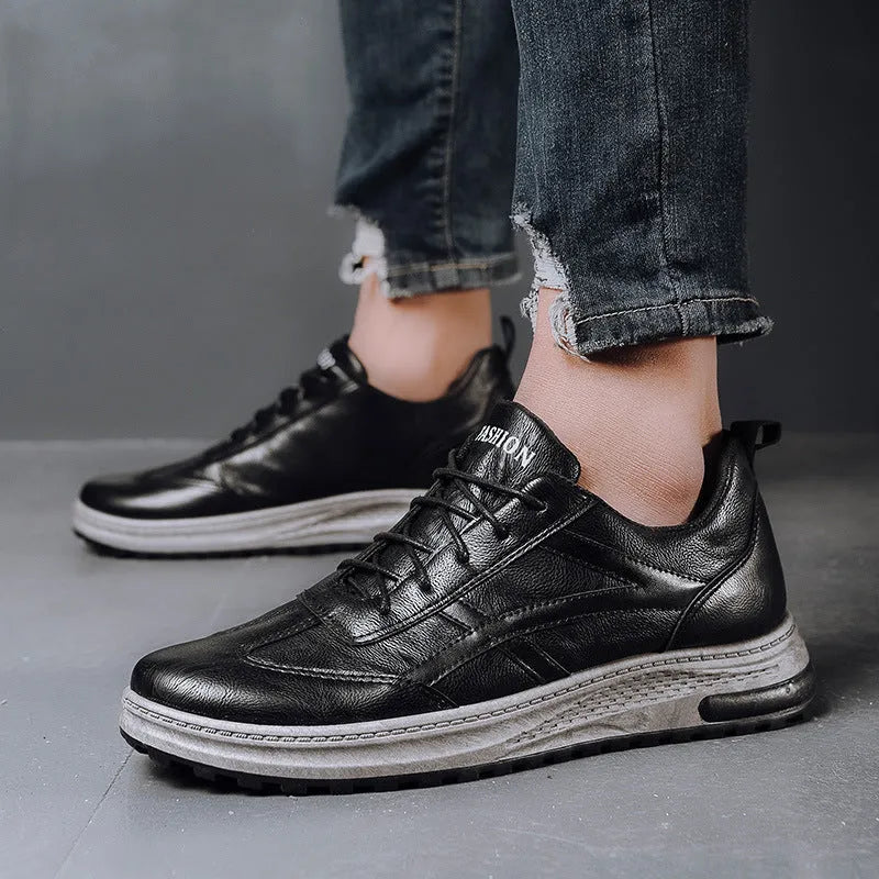Unik men's casual sneakers in black with plastic cement sole and shallow mouth design