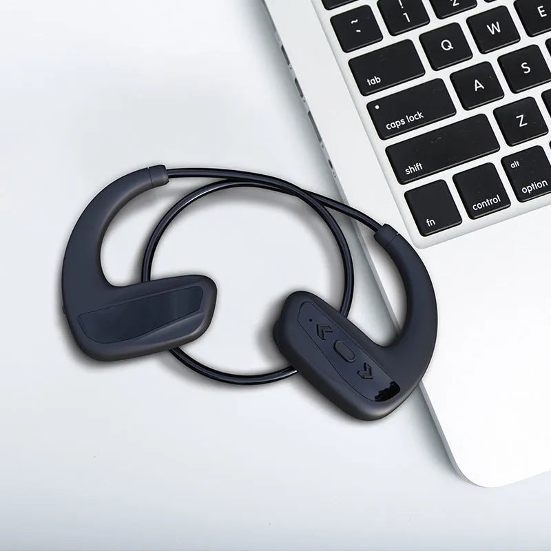 Black waterproof Bluetooth swimming headset with dual earpieces and head-mounted design for pool and running use