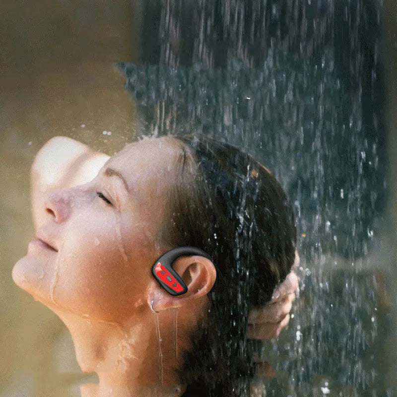 Black waterproof Bluetooth swimming headset with dual earpieces and head-mounted design for pool and running use