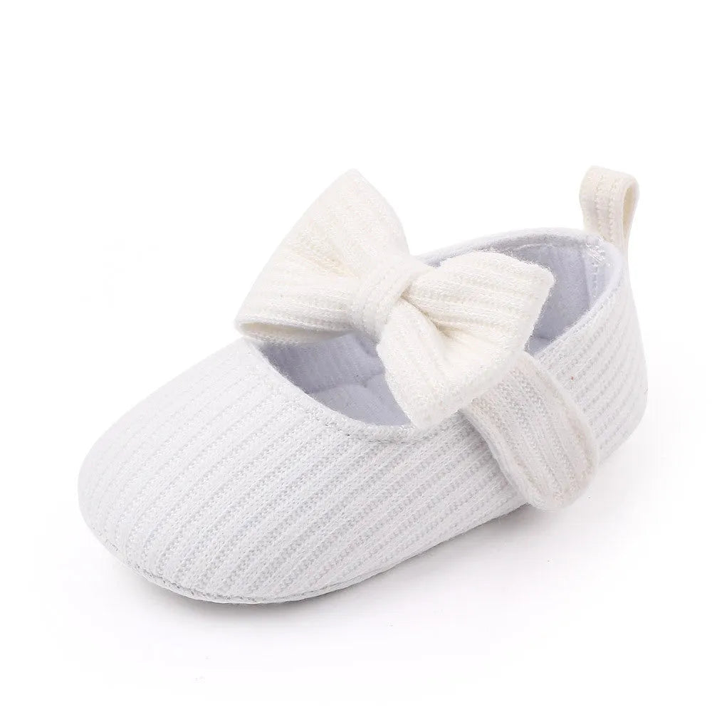 Bowknot woolen knit baby shoes in moccasin style with Velcro fastening, available in pink