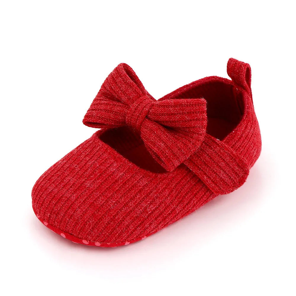Bowknot woolen knit baby shoes in moccasin style with Velcro fastening, available in pink