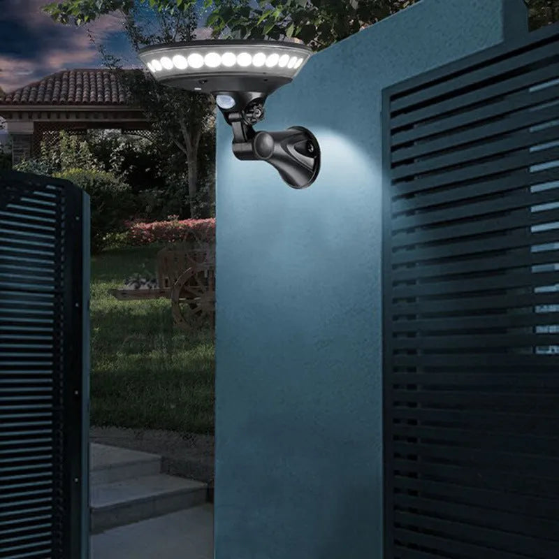 White 360-degree luminous solar garden light with solar panel on top.