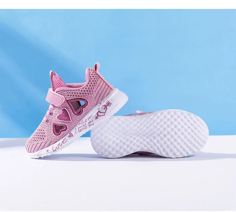 Pair of pink children's velcro sneakers with mesh upper and hand-painted pattern on a white background.