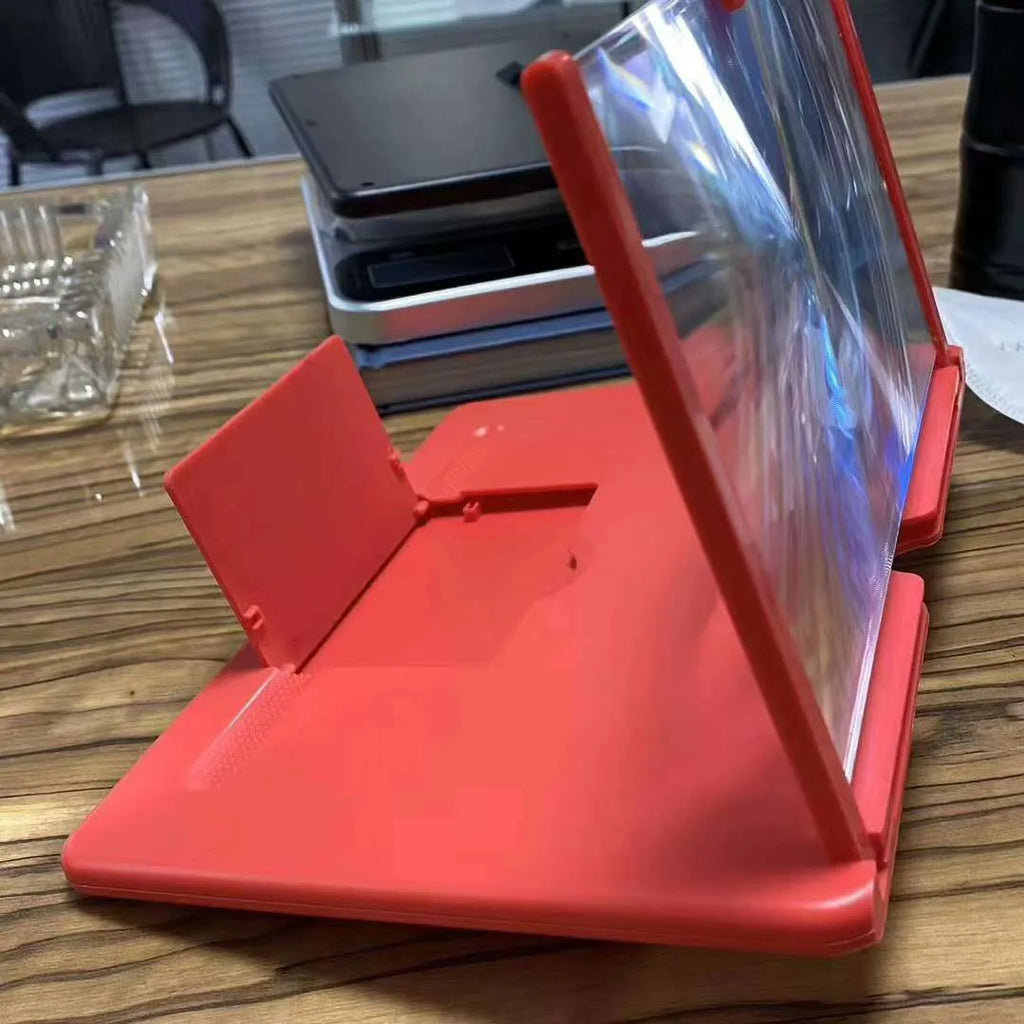 Acrylic lens phone screen magnifier with a smartphone in place, in black, white, and red