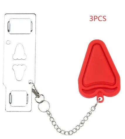 Red portable door safety latch lock with chrome-plated metal piece installed on a wooden door jamb