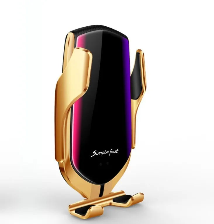 Magic Clip R1 wireless charging car phone holder in gold mounted on a car dashboard.