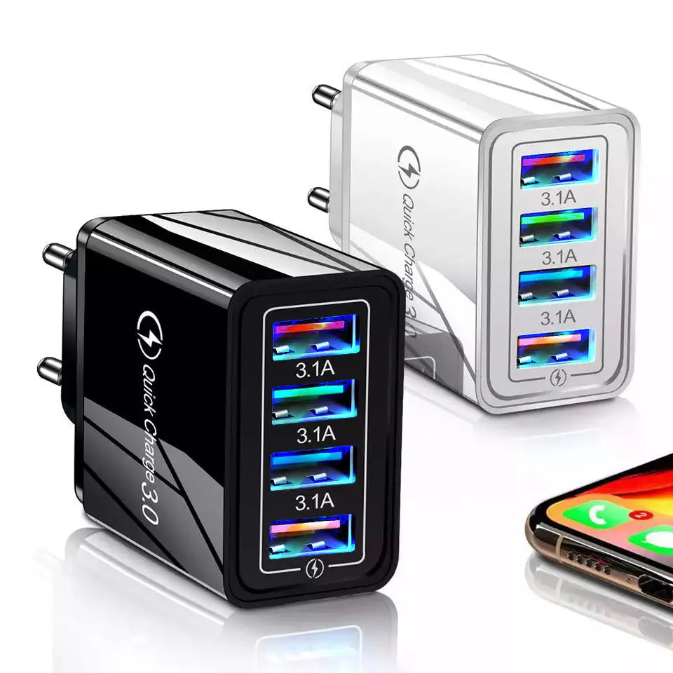 Simple Luminous 4-port USB wall charger in dark blue, plugged into a socket with four cables connected.
