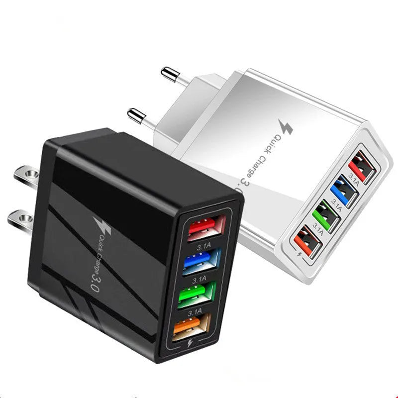 Simple Luminous 4-port USB wall charger in dark blue, plugged into a socket with four cables connected.